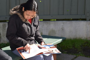 Practicing interactive reading at Tandem family workshop.